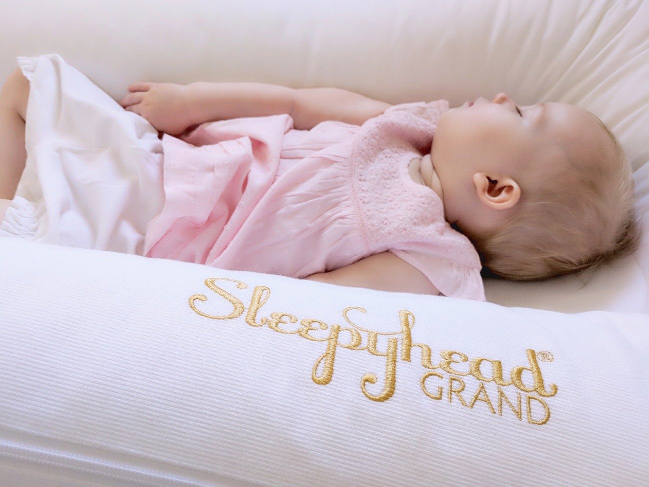 Sleeping Baby in Sleepyhead Grand Baby Pod