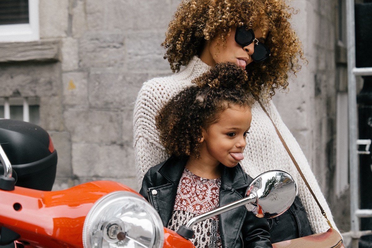 Mother and Daughter Sticking Out Tongues